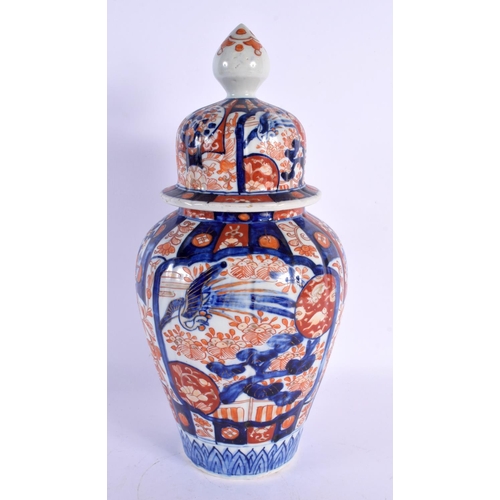 1976 - A LARGE 19TH CENTURY JAPANESE MEIJI PERIOD IMARI VASE AND COVER together with a pair of similar plat... 