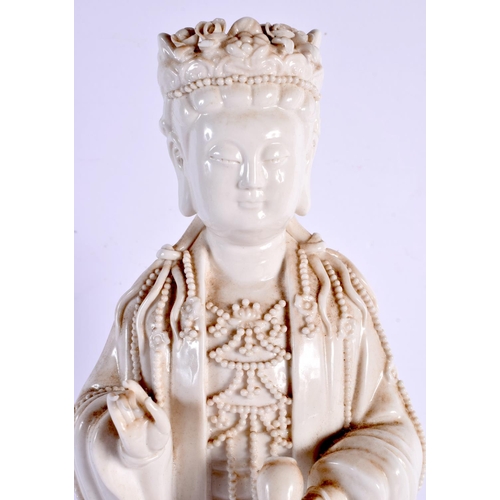 1993 - AN EARLY 20TH CENTURY CHINESE BLANC DE CHINE FIGURE OF A BUDDHA Late Qing/Republic. 37 cm high.