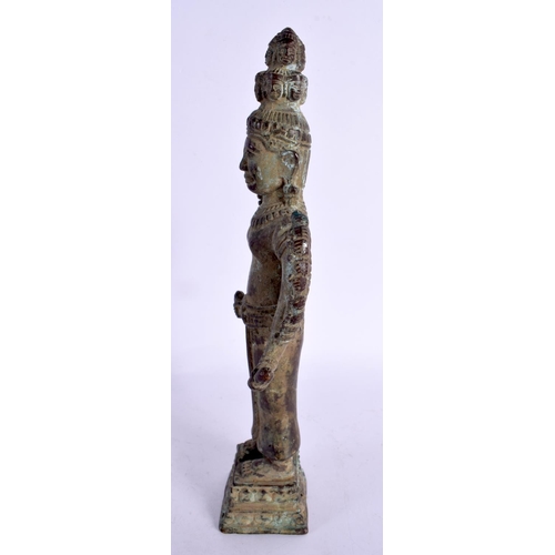 1995 - A 19TH CENTURY SOUTH EAST ASIAN BRONZE FIGURE OF A BUDDHA probably Cambodian, modelled with multiple... 