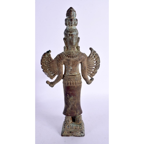 1995 - A 19TH CENTURY SOUTH EAST ASIAN BRONZE FIGURE OF A BUDDHA probably Cambodian, modelled with multiple... 