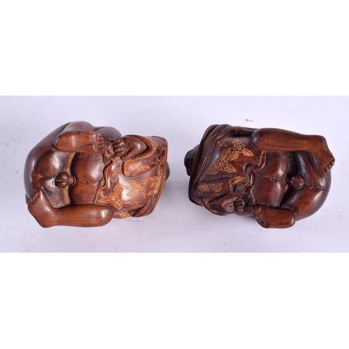 1997 - A CHARMING PAIR OF JAPANESE CARVED BOXWOOD EROTIC NETSUKES modelled with figures romping. 7 cm x 3 c... 