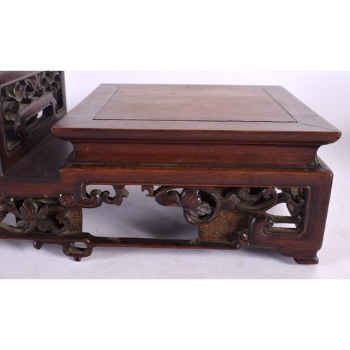 2006 - A LARGE 19TH CENTURY CHINESE CARVED HARDWOOD THREE STEPPED STAND Qing. 54 cm x 18 cm x 16 cm.