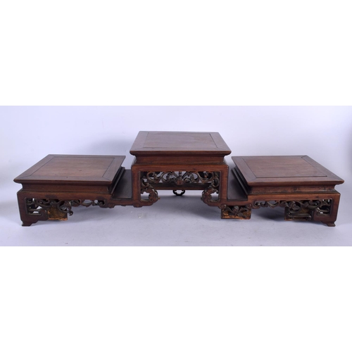 2006 - A LARGE 19TH CENTURY CHINESE CARVED HARDWOOD THREE STEPPED STAND Qing. 54 cm x 18 cm x 16 cm.