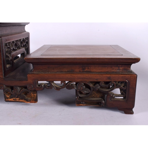 2006 - A LARGE 19TH CENTURY CHINESE CARVED HARDWOOD THREE STEPPED STAND Qing. 54 cm x 18 cm x 16 cm.