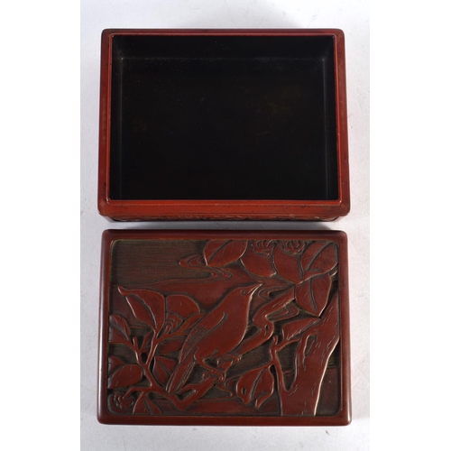 2015 - A 19TH CENTURY JAPANESE MEIJI PERIOD RED LACQUER BOX AND COVER decorated with birds amongst foliage.... 