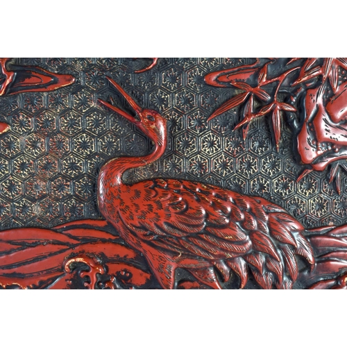 2017 - A 19TH CENTURY JAPANESE MEIJI PERIOD RED LACQUER COVER decorated with birds amongst foliage. 24 cm x... 