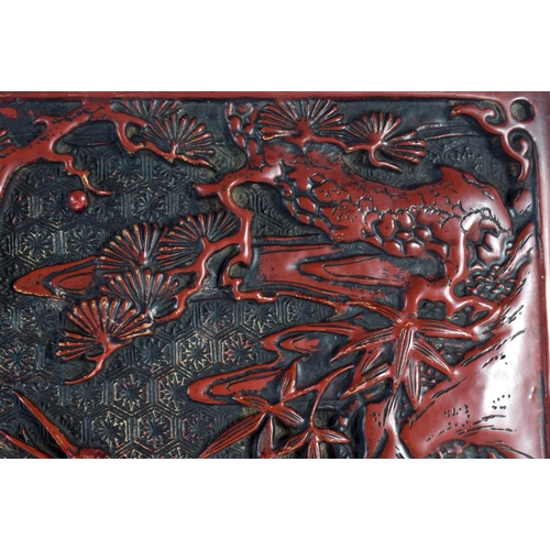 2017 - A 19TH CENTURY JAPANESE MEIJI PERIOD RED LACQUER COVER decorated with birds amongst foliage. 24 cm x... 