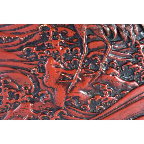 2017 - A 19TH CENTURY JAPANESE MEIJI PERIOD RED LACQUER COVER decorated with birds amongst foliage. 24 cm x... 