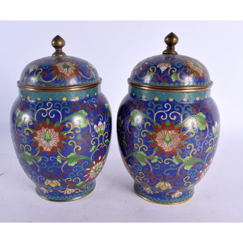 2023 - A PAIR OF 19TH CENTURY CHINESE CLOISONNE ENAMEL VASES AND COVER decorated with foliage. 18 cm x 8 cm... 