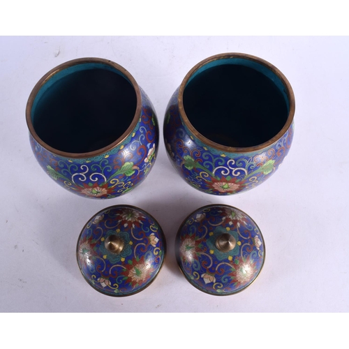 2023 - A PAIR OF 19TH CENTURY CHINESE CLOISONNE ENAMEL VASES AND COVER decorated with foliage. 18 cm x 8 cm... 