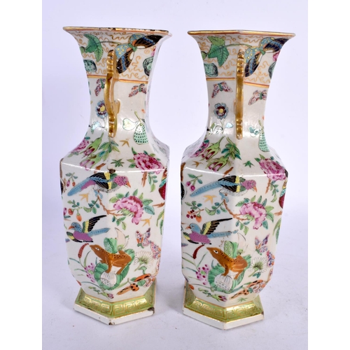 2029 - A PAIR OF 19TH CENTURY CHINESE TWIN HANDLED FAMILLE ROSE VASES Qing. 22 cm x 8 cm.