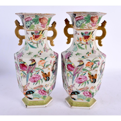 2029 - A PAIR OF 19TH CENTURY CHINESE TWIN HANDLED FAMILLE ROSE VASES Qing. 22 cm x 8 cm.