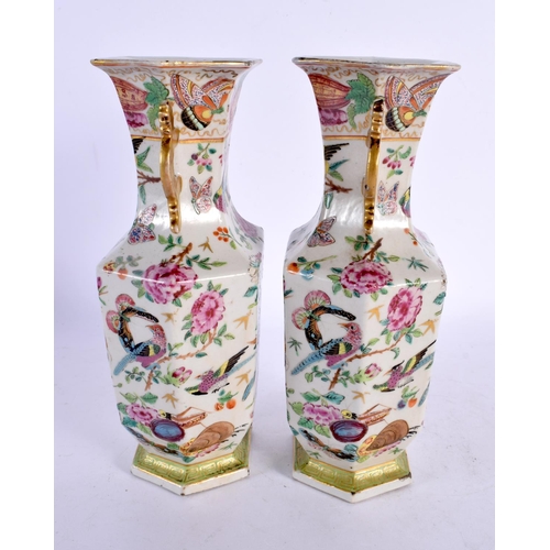 2029 - A PAIR OF 19TH CENTURY CHINESE TWIN HANDLED FAMILLE ROSE VASES Qing. 22 cm x 8 cm.