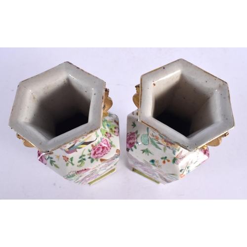 2029 - A PAIR OF 19TH CENTURY CHINESE TWIN HANDLED FAMILLE ROSE VASES Qing. 22 cm x 8 cm.