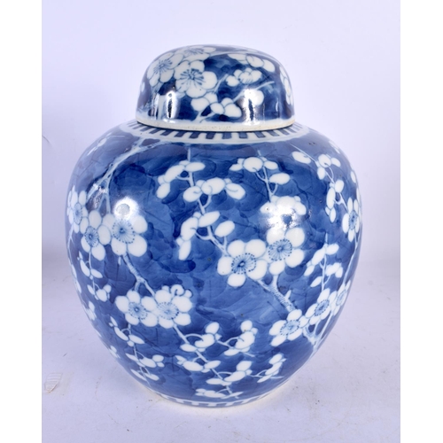 2031 - A LARGE 19TH CENTURY CHINESE BLUE AND WHITE PORCELAIN GINGER JAR AND COVER bearing Kangxi marks to b... 