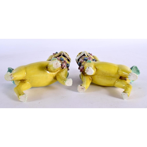 2037 - A PAIR OF 19TH CENTURY CHINESE YELLOW GLAZED PORCELAIN FIGURES OF BEASTS Qing. 12 cm x 10 cm.