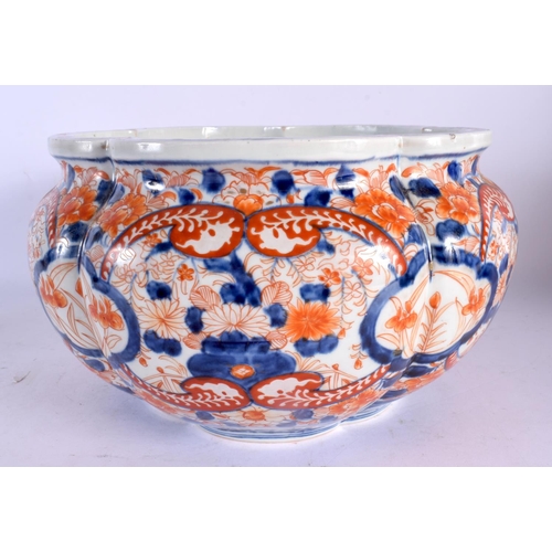 2056 - A LARGE 19TH CENTURY JAPANESE MEIJI PERIOD LOBED IMARI PLANTER painted with foliage. 25 cm x 18 cm.