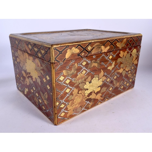 2057 - A LARGE 19TH CENTURY JAPANESE MEIJI PERIOD GOLD LACQUER BOX with silver inlaid drawer, decorated in ... 