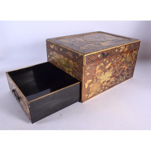 2057 - A LARGE 19TH CENTURY JAPANESE MEIJI PERIOD GOLD LACQUER BOX with silver inlaid drawer, decorated in ... 