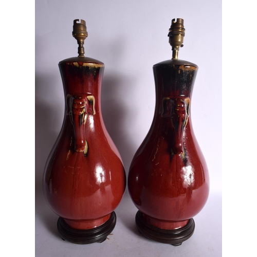 2058 - A PAIR OF EARLY 20TH CENTURY CHINESE TWIN HANDLED FLAMBE LAMPS Late Qing/Republic. 45 cm x 15 cm.