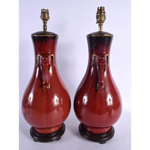 2058 - A PAIR OF EARLY 20TH CENTURY CHINESE TWIN HANDLED FLAMBE LAMPS Late Qing/Republic. 45 cm x 15 cm.