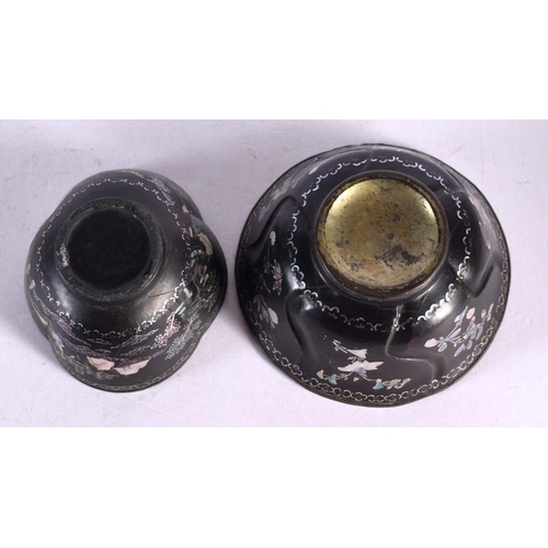 2064 - TWO 17TH/18TH CENTURY CHINESE BLACK LACQUER TEABOWLS Kangxi/Yongzheng. Largest 7.5 cm wide. (2)