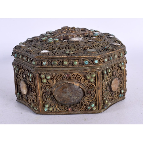 2065 - AN 18TH CENTURY TIBTAN BRONZE BUDDHISTIC BOX AND COVER inlaid with hardstones, turquoise and beasts.... 