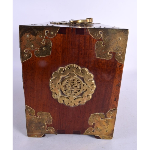 2068 - AN EARLY 20TH CENTURY CHINESE CARVED HARDWOOD BRASS BOUND CASKET overlaid with figures and bats. 30 ... 