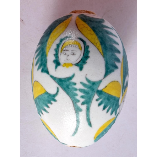 2072 - A TURKISH OTTOMAN ARMENIAN EGG painted with figures. 9 cm x 6 cm.