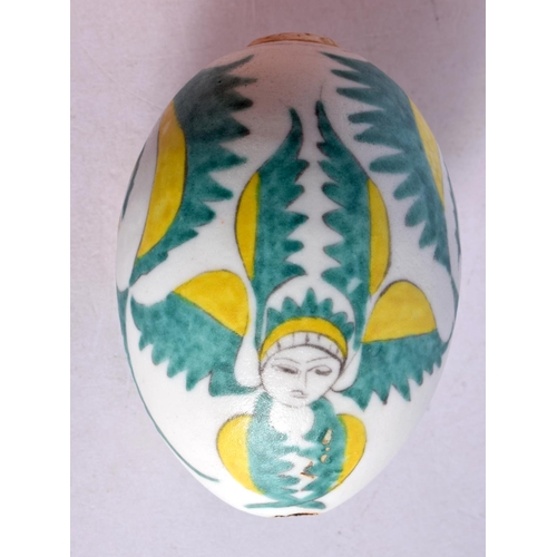 2072 - A TURKISH OTTOMAN ARMENIAN EGG painted with figures. 9 cm x 6 cm.