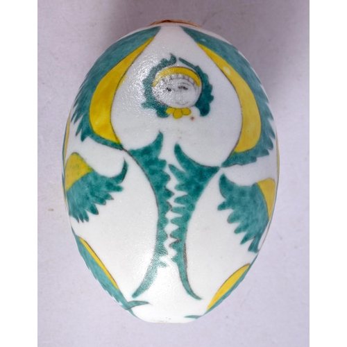 2072 - A TURKISH OTTOMAN ARMENIAN EGG painted with figures. 9 cm x 6 cm.