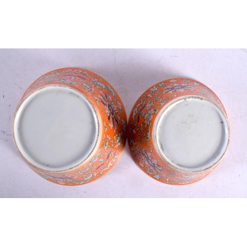 2091 - A RARE NEAR PAIR OF 19TH CENTURY CHINESE CORAL GROUND BOWLS Late Qing. Largest 9.5 cm diameter. (2)