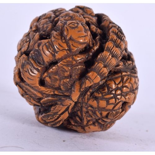 2093 - A LATE 19TH CENTURY CHINESE CARVED NUT. 4 cm wide.