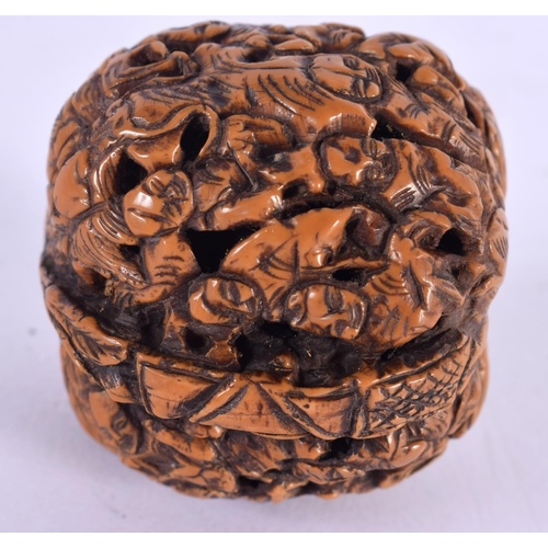 2093 - A LATE 19TH CENTURY CHINESE CARVED NUT. 4 cm wide.