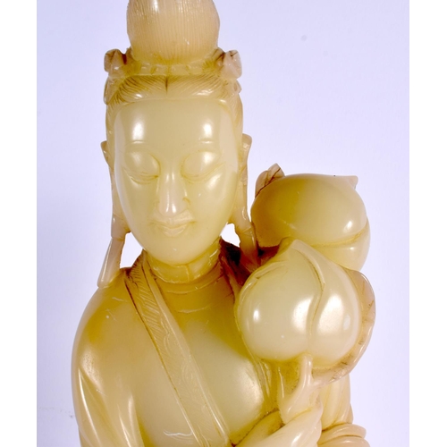 2141 - A LARGE 19TH CENTURY CHINESE CARVED GREEN JADE FIGURE OF A FEMALE modelled holding a flower. 38 cm h... 