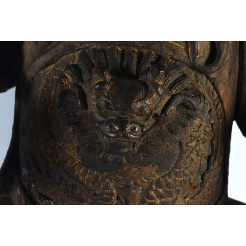 2144 - A VERY LARGE 18TH CENTURY CHINESE CARVED WOOD FIGURE OF A GUARDIAN Guangong, modelled upon a dragon ... 