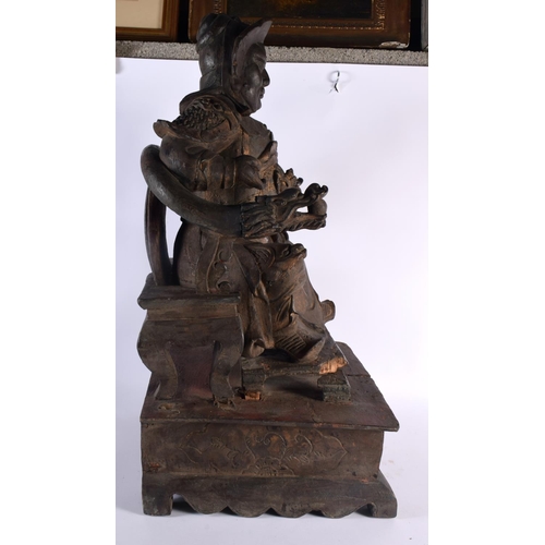 2144 - A VERY LARGE 18TH CENTURY CHINESE CARVED WOOD FIGURE OF A GUARDIAN Guangong, modelled upon a dragon ... 