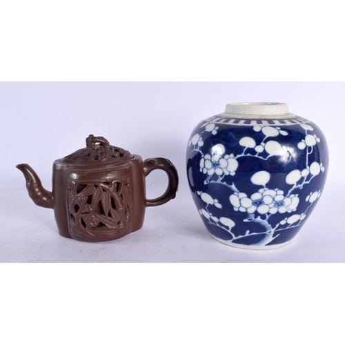 2154 - AN EARLY 20TH CENTURY CHINESE YIXING POTTERY TEAPOT AND COVER Late Qing/Republic, together with a gi... 