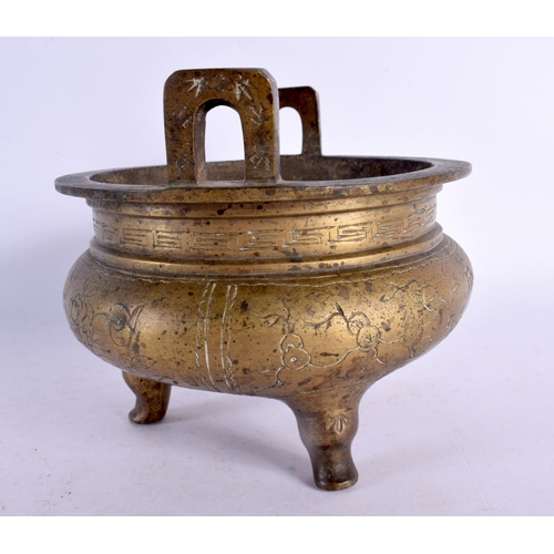 2160 - A 19TH CENTURY CHINESE TWIN HANDLED BRONZE CENSER bearing Xuande marks to base. 15 cm x 13 cm.