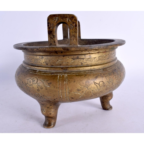 2160 - A 19TH CENTURY CHINESE TWIN HANDLED BRONZE CENSER bearing Xuande marks to base. 15 cm x 13 cm.