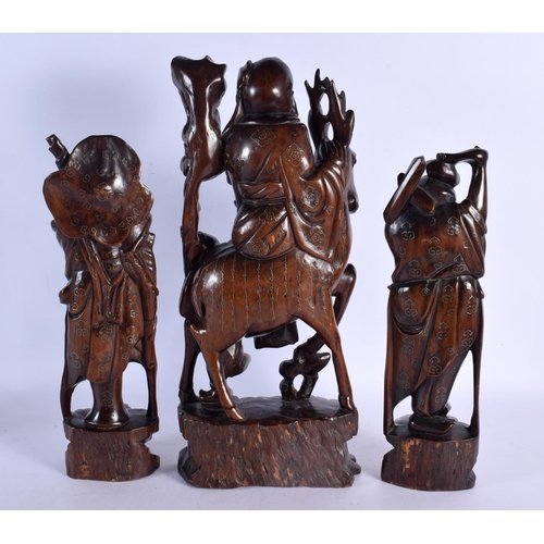 2172 - A SET OF THREE LARGE 19TH CENTURY CHINESE SILVER INLAID HARDWOOD FIGURES Qing. 44 cm x 15 cm. (3)