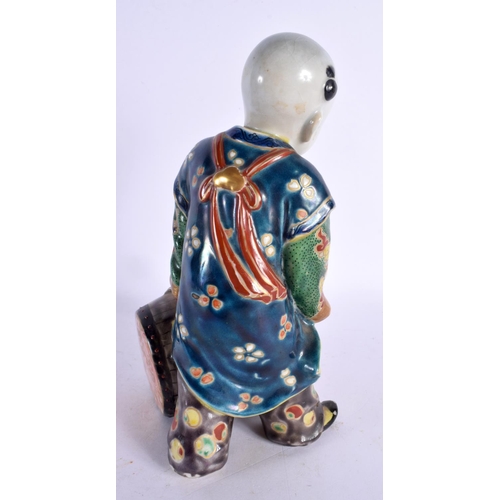 2173 - A 19TH CENTURY JAPANESE MEIJI PERIOD AO KUTANI FIGURE. 24 cm high.