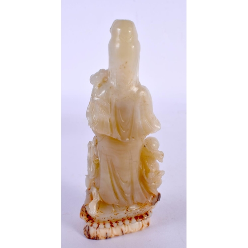 2184 - A CHINESE CARVED GREEN JADE FIGURE OF A STANDING DEITY 20th Century. 15 cm x 5 cm.