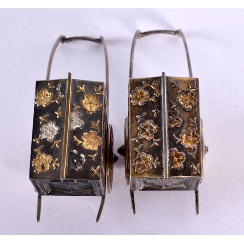 2190 - A PAIR OF JAPANESE TAISHO PERIOD SILVER MIXED METAL RICKSHAW CONDIMENTS. 45 grams. 6.5 cm x 3.75 cm.