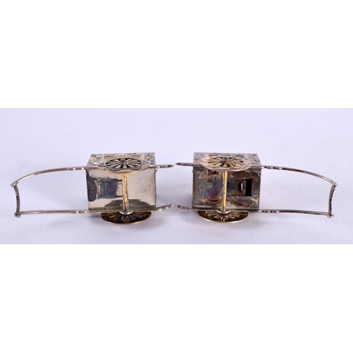 2190 - A PAIR OF JAPANESE TAISHO PERIOD SILVER MIXED METAL RICKSHAW CONDIMENTS. 45 grams. 6.5 cm x 3.75 cm.