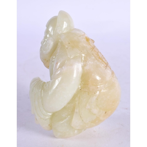 2192 - A CHINESE CARVED GREEN JADE FIGURE OF A SCHOLAR 20th Century. 8.25 cm x 6 cm.