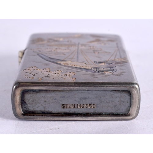 2196 - A JAPANESE TAISHO PERIOD SILVER AND MIXED METAL LIGHTER. 62 grams. 5.75 cm x 4 cm x 1 cm.