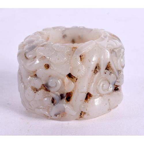 2198 - A CHINESE CARVED JADE ARCHERS RING 20th Century. X. 2.2 cm x 4 cm.