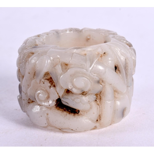 2198 - A CHINESE CARVED JADE ARCHERS RING 20th Century. X. 2.2 cm x 4 cm.