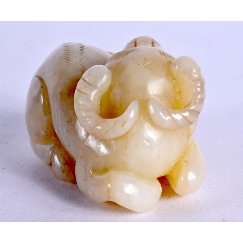 2201 - A CHINESE CARVED JADE BULL 20th Century. 6 cm x 3 cm.